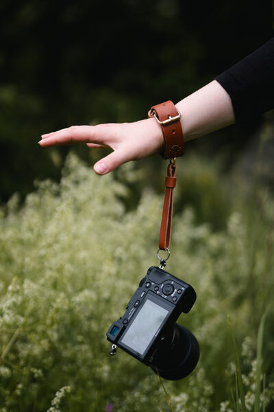 Brown gold wrist strap